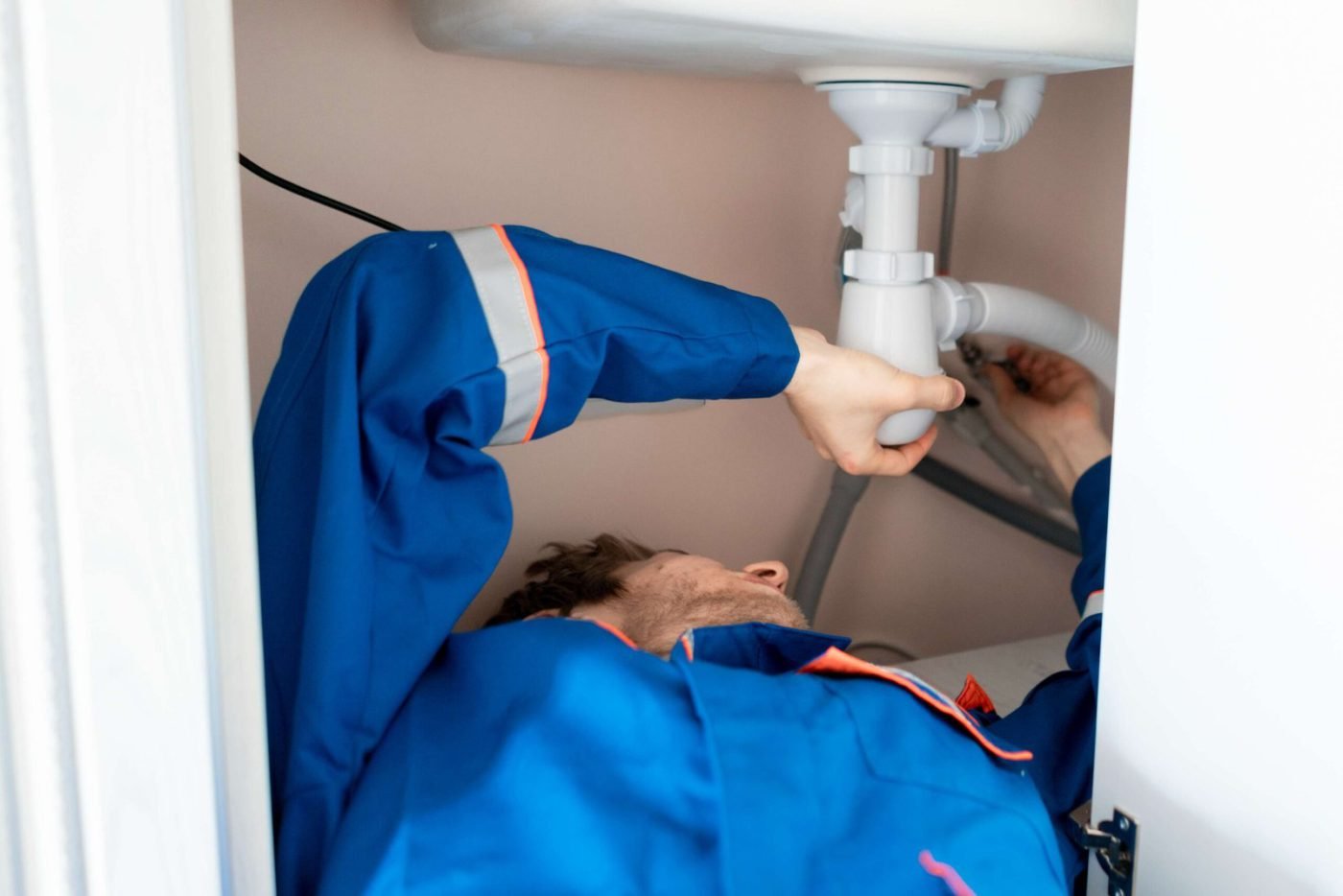 Drain Unclogging by New Well Plumbing & Heating